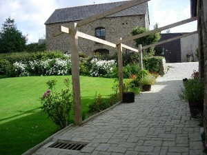 Path to converted barn with 'Swallow Barn' bedroom