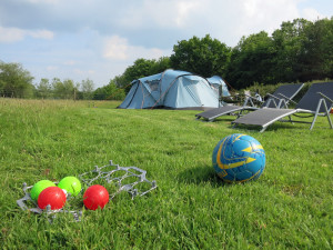 Camping with plenty of space to play games & explore the farm
