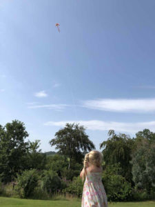 Fly a kite as high as you can!
