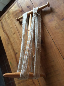 Wind spun yarn onto Niddy Noddy