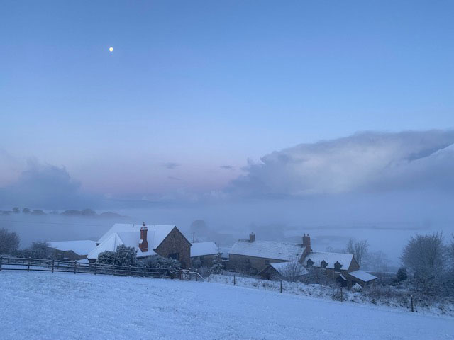 Snowy house & moon