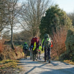 Walkers departing having camped at Huxtable Farm B&B